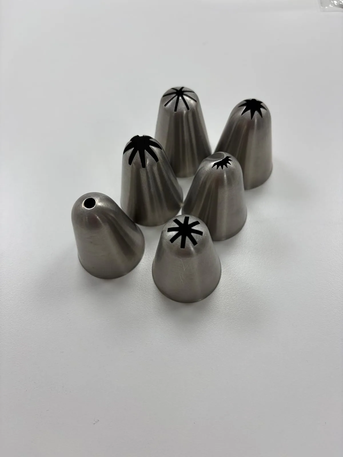 Set of 6 large stainless steel piping nozzles